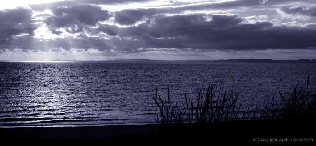 Suns rays over Carskiey Bay
